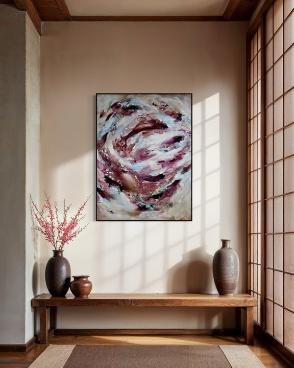 An abstract painting with swirling purple, pink, white, and gray brushstrokes hangs on a beige wall in a styled interior with a wooden bench, vases, and shoji-style doors.